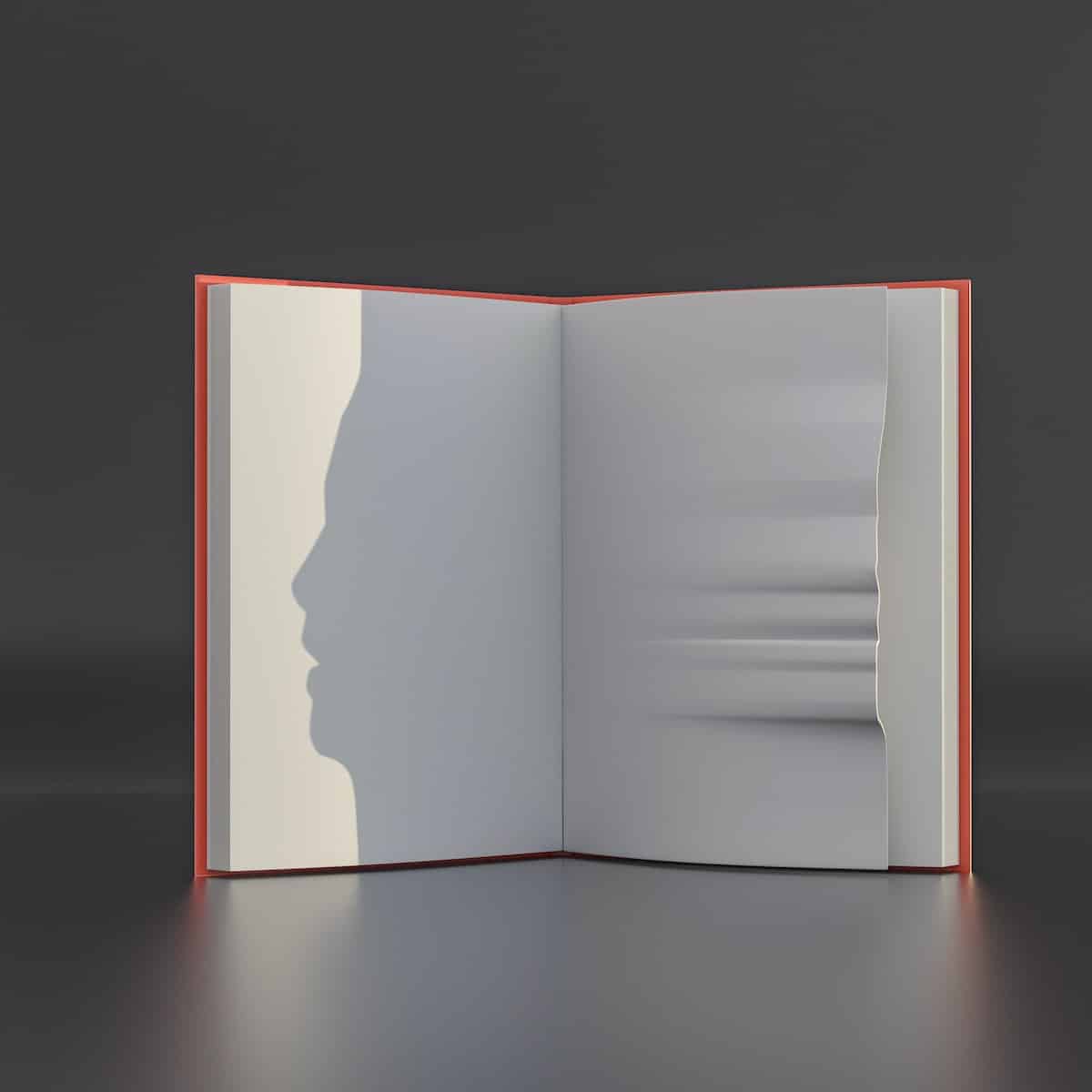 an open book with a shadow of a person