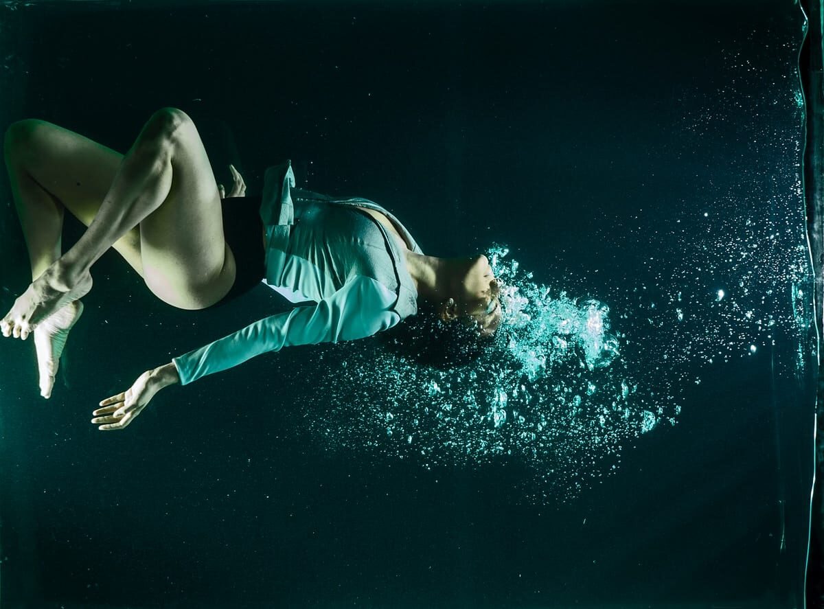 woman in black and white long sleeve dress