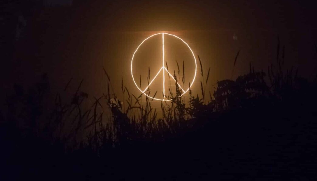 Peace sign logo neon signage