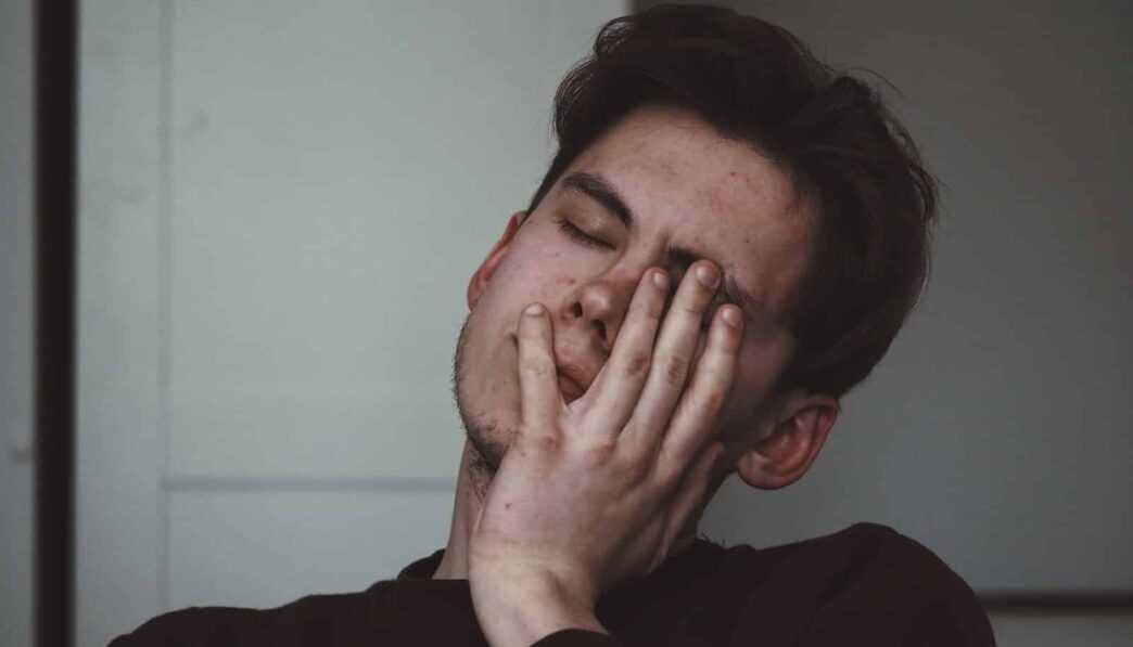 man wearing black crew-neck top
