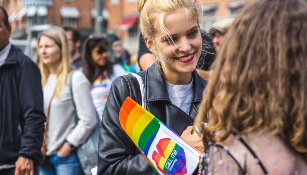 woman smiling wearing black leather jacket