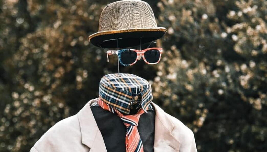 necktie, hat, and sunglasses